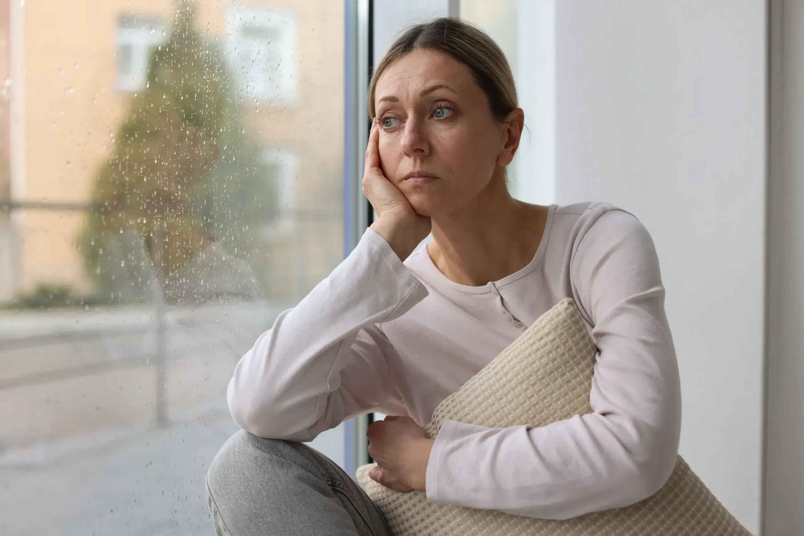 Person quietly seeking depression support at Gonzales-Vigilar Psychiatric Services in Ashburn, VA