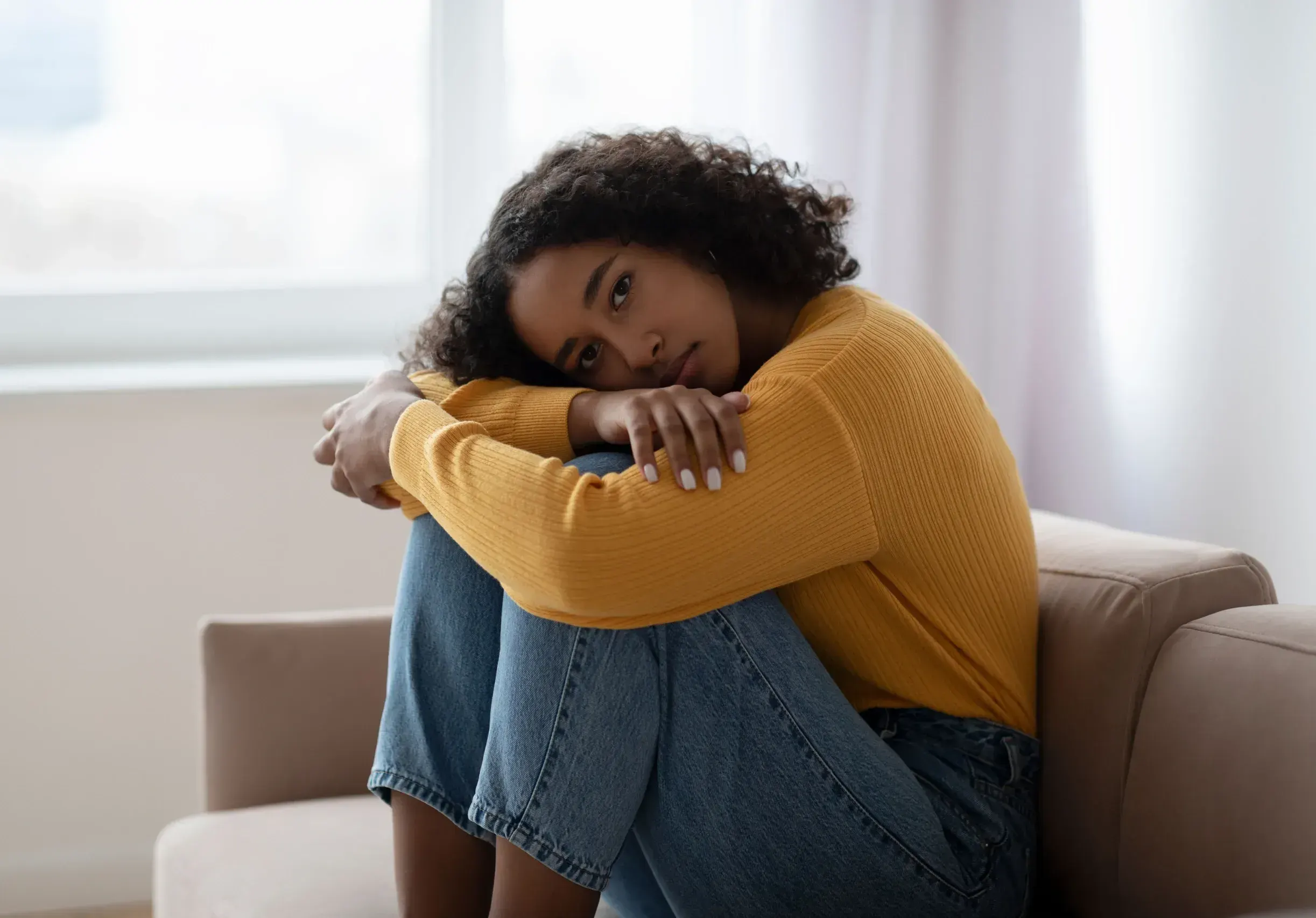New mother recognizing symptoms of postpartum depression and seeking help from Gonzales-Vigilar Psychiatric Services in Ashburn, VA