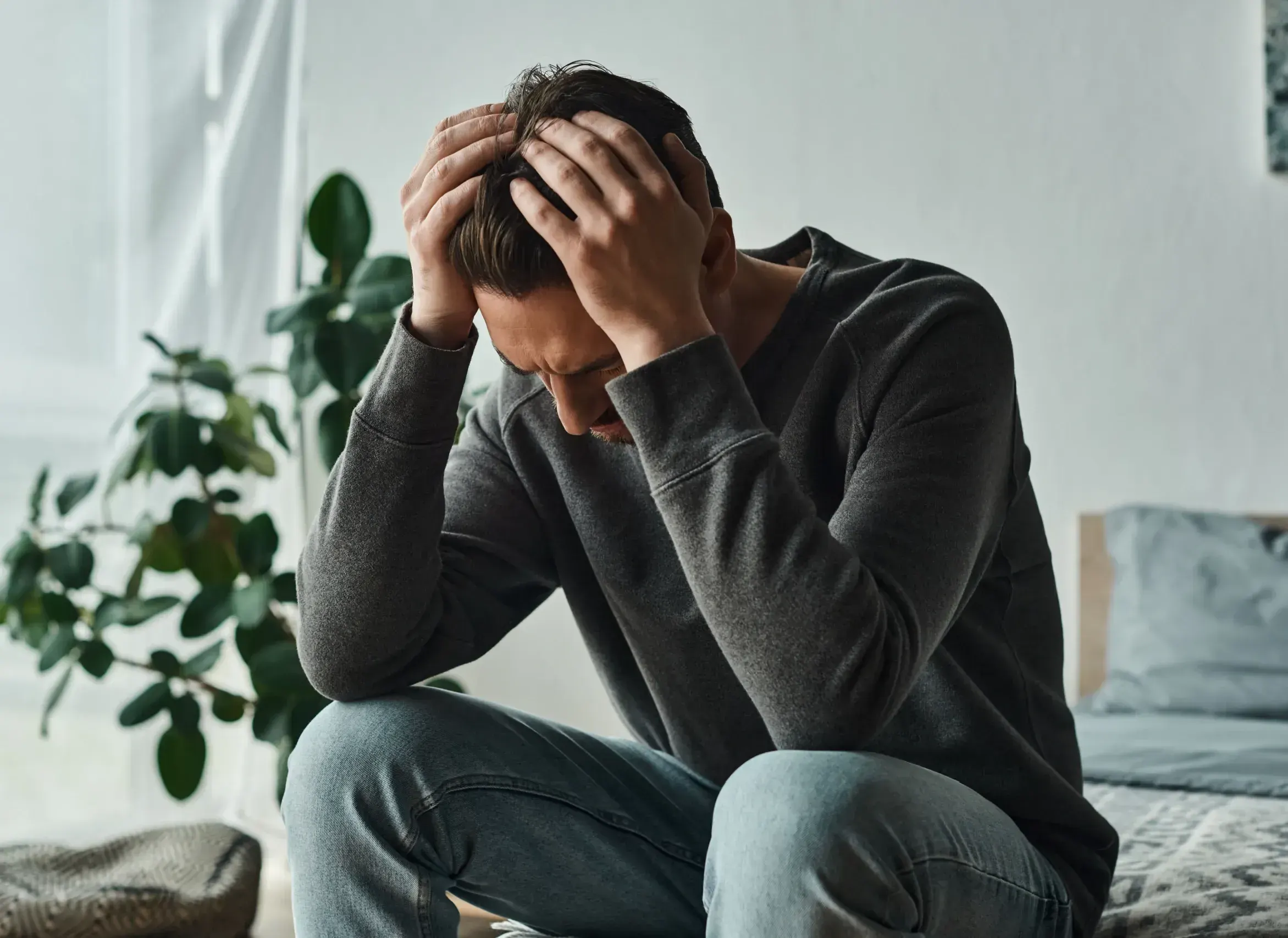 Person reflecting on persistent depression symptoms before contacting Gonzales-Vigilar Psychiatric Services